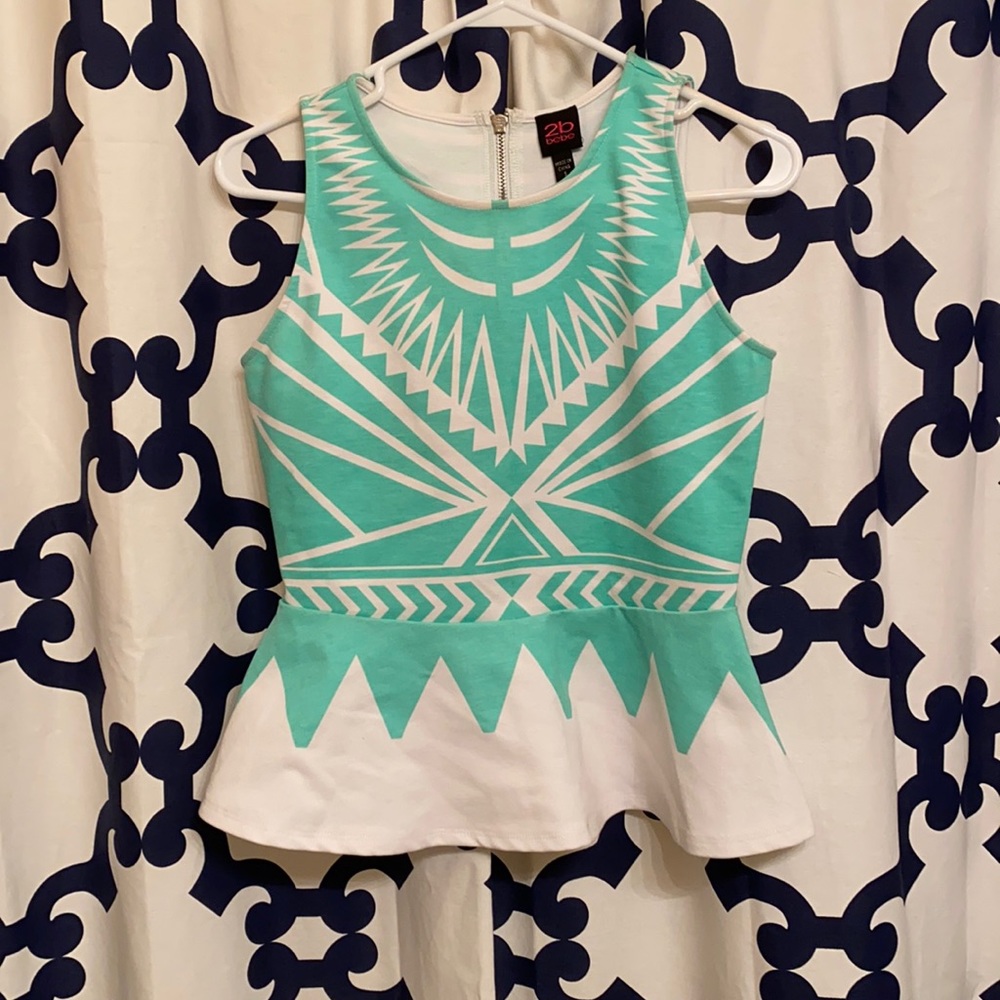 Mint green and white peplum sleeveless top